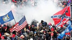 FILE PHOTO: Tear gas is released into a crowd of protesters during clashes with Capitol police at a rally to contest the certification of the 2020 U.S. presidential election results by the U.S. Congress, at the U.S. Capitol Building in Washington, U.S, Ja
