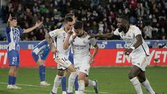 Lucas Vázquez’s injury-time winner moves Madrid above Girona to the top of LaLiga despite Nacho’s second-half red card.