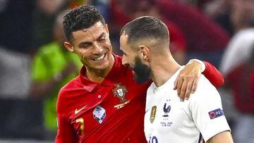BUDAPEST, HUNGARY - JUNE 23: Karim Benzema of France interacts with Cristiano Ronaldo of Portugal during the UEFA Euro 2020 Championship Group F match between Portugal and France at Puskas Arena on June 23, 2021 in Budapest, Hungary. (Photo by Franck Fife - Pool/Getty Images)