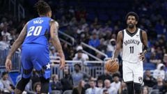 ORLANDO, FLORIDA - MARCH 15: Kyrie Irving #11 of the Brooklyn Nets dribbles the ball up the court against the Orlando Magic in the first half at Amway Center on March 15, 2022 in Orlando, Florida. NOTE TO USER: User expressly acknowledges and agrees that,