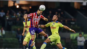 Ricardo Chavez (L) of Atletico San Luis fights for the ball with Sebastian Caceres (R) of America during the Semifinals second leg match between Club Aguilas del America and Atletico de San Luis as part of Torneo Apertura 2023 Liga BBVA MX, at Azteca Stadium, December 09, 2023, in Mexico City. Mexico.