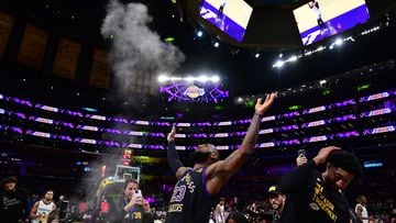 Nov 14, 2023; Los Angeles, California, USA; Los Angeles Lakers forward LeBron James (23) tosses up powder before playing against the Memphis Grizzlies at Crypto.com Arena. Mandatory Credit: Gary A. Vasquez-USA TODAY Sports