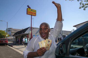 Hawthorne, CA - July 29: Cindy McAdoo-Stewart (Cq) drove from Lancaster to buy Mega Millions lottery, as jackpot tops $1 billion, from Bluebird Liquor on Friday, July 29, 2022 in Hawthorne, CA. (Irfan Khan / Los Angeles Times via Getty Images)
