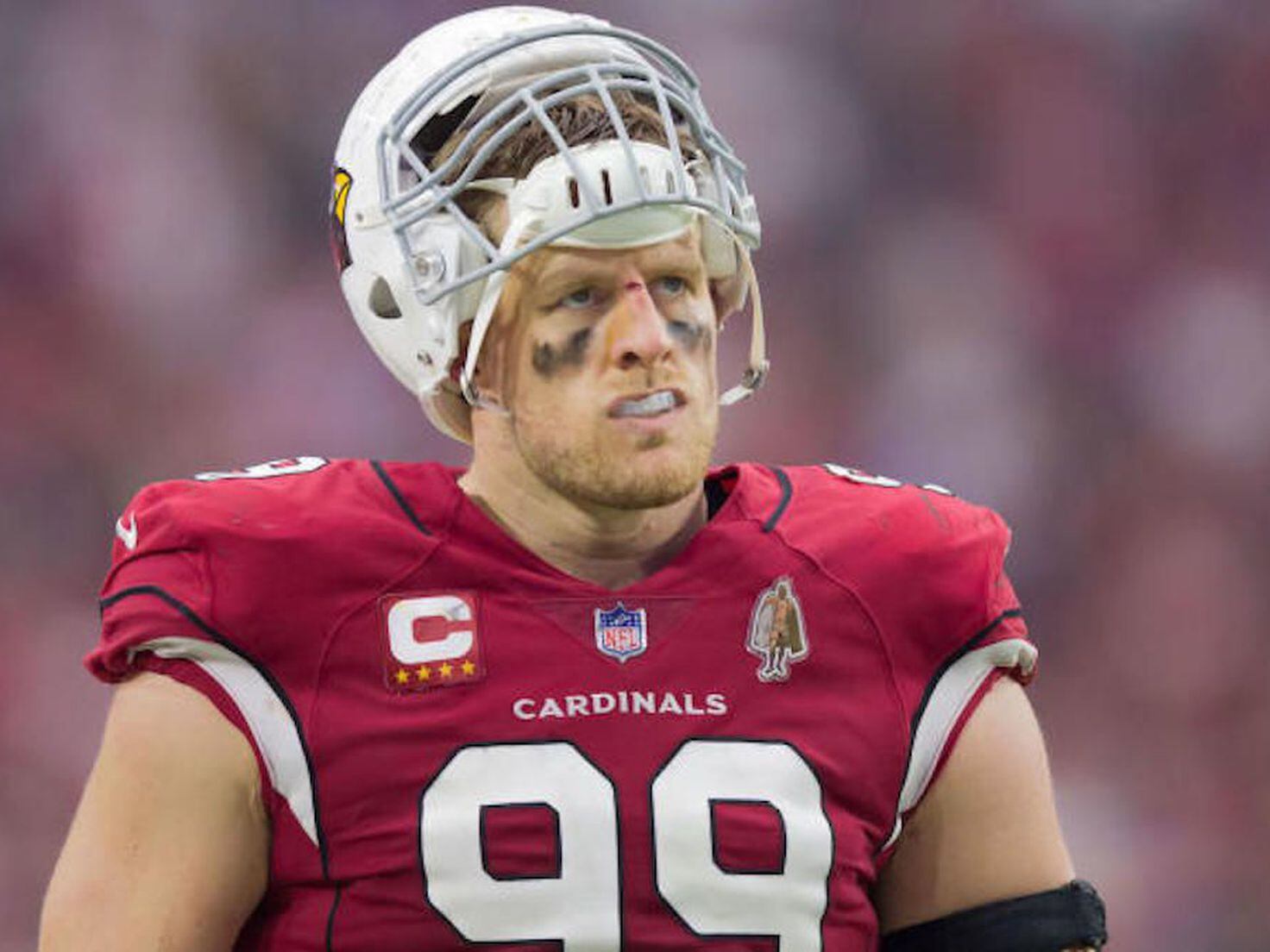 Arizona Cardinals defensive end J.J. Watt takes a break in the