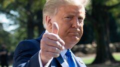 US President Donald Trump gives a thumbs-up as he departs the White House in Washington, DC, on October 15, 2020.