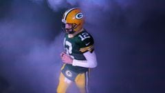 Jan 16, 2021; Green Bay, WI, USA; Green Bay Packers quarterback Aaron Rodgers (12) runs on the field before the 32-18 win over the Los Angeles Rams during the NFC divisional playoff game Saturday, Jan. 16, 2021, at Lambeau Field in Green Bay, Wis.  Mandat