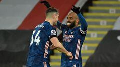 Arsenal&#039;s French striker Alexandre Lacazette (R) celebrates with Arsenal&#039;s Swiss midfielder Granit Xhaka (L) after scoring their third goal during the English Premier League football match between Sheffield United and Arsenal at Bramall Lane in 