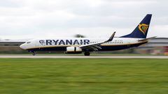 FILE PHOTO: A Ryanair aircraft lands on the southern runway at Gatwick Airport in Crawley, Britain, August 25, 2021.  REUTERS/Peter Nicholls/File Photo