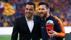 Xavi, con Messi en una imagen de 2022.
