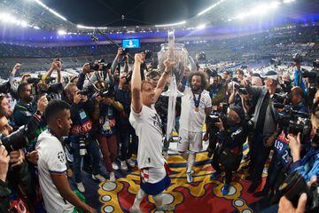 Luka Modric and Marcelo of Real Madrid lift the trophy after winning with his team the the UEFA Champions League final 
