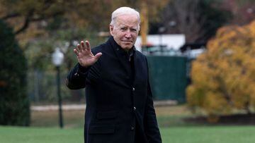 US President Joe Biden walks to the Oval office after getting off Marine One on the South Lawn of the White House.