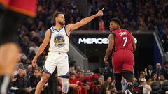 Oct 27, 2022; San Francisco, California, USA; Golden State Warriors guard Stephen Curry (30) reacts after making a shot next to Miami Heat guard Kyle Lowry (7) in the second quarter at the Chase Center. Mandatory Credit: Cary Edmondson-USA TODAY Sports