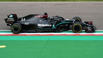 Hamilton wins at Emilia Romagna as Mercedes seal title