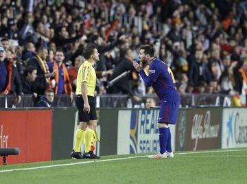 An incredulous Messi pleads with the assistant referee after his 'ghost goal' was not given at Mestalla.