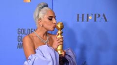 Lady Gaga poses with the trophy during the 76th annual Golden Globe Awards at the Beverly Hilton hotel in Beverly Hills, California.