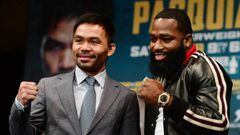 NEW YORK, NY - NOVEMBER 19: Manny Pacquiao (L) and Adrien Broner face off during a press conference at Gotham Hall in preparation for their upcoming match on November 19, 2018 in New York City. The match is set to take place on January 19, 2019 in Las Veg