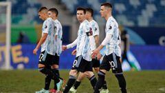 Argentina&#039;s Lionel Messi (C) and teammates leave the field at the end of the Conmebol Copa America 2021 football tournament group phase match against Bolivia at the Arena Pantanal Stadium in Cuiaba, Brazil, on June 28, 2021. (Photo by SILVIO AVILA / AFP)