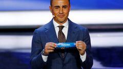 Soccer Football - 2018 FIFA World Cup Draw - State Kremlin Palace, Moscow, Russia - December 1, 2017   Fabio Cannavaro pulls out Panama during the draw   REUTERS/Kai Pfaffenbach