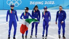 Team Italy celebrate winning the Silver medal during the Mixed Team Relay Final A on day one of the Beijing 2022 Winter Olympic Games at Capital Indoor Stadium on February 05, 2022 in Beijing, China.
