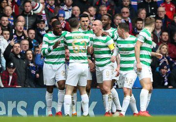 GLASGOW, SCOTLAND - MARCH 11:  Tomas Rogic of Celtic celebrates after scoring his sides first goal with his Celtic team mates during the Ladbrokes Scottish Premiership match between Rangers and Celtic at Ibrox Stadium on March 11, 2018 in Glasgow, Scotlan