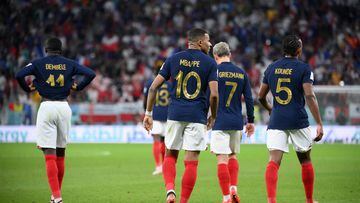 France's forward #10 Kylian Mbappe (C) celebrates with teammates after he scored his team's second goal with during the Qatar 2022 World Cup round of 16 football match between France and Poland at the Al-Thumama Stadium in Doha on December 4, 2022. (Photo by FRANCK FIFE / AFP)