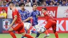 Japan's Kaoru Mitoma (2nd L) shoots the ball to score the team's second goal during the friendly football match between Japan and Peru at Suita City Stadium in the city of Suita, Osaka prefecture on June 20, 2023. (Photo by JIJI Press / AFP) / Japan OUT