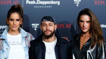 Brazilian football star Neymar, or Neymar Jr., poses as he arrives