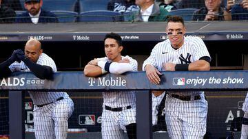 NEW YORK, NEW YORK - OCTOBER 18: Aaron Hicks #31, Oswaldo Cabrera #95 and Aaron Judge #99 of the New York Yankees look on from the dugout during the first inning against the Cleveland Guardians in game five of the American League Division Series at Yankee Stadium on October 18, 2022 in New York, New York. (Photo by Elsa/Getty Images)