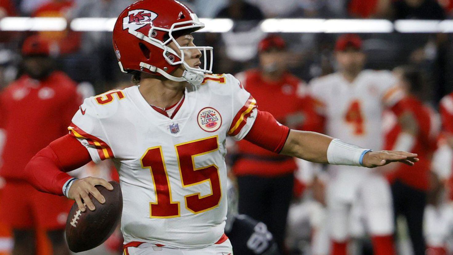 Kansas City Chiefs quarterback Patrick Mahomes (15) drops back to