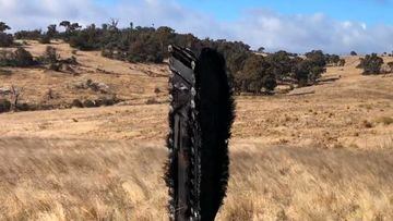 Debris from SpaceX Crew-1 is seen on a field in Dalgety, Australia July 29, 2022 in this picture obtained from social media. Brad Tucker/via REUTERS  THIS IMAGE HAS BEEN SUPPLIED BY A THIRD PARTY. MANDATORY CREDIT.