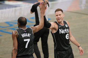 NEW YORK, NEW YORK - APRIL 25: Kevin Durant #7 high-fives Blake Griffin #2 of the Brooklyn Nets during the second half against the Phoenix Suns at Barclays Center on April 25, 2021