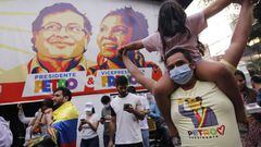 Supporters of Colombian left-wing presidential candidate Gustavo Petro celebrate after the presidential runoff election in Bucaramanga, Colombia, on June 19, 2022. - Colombia's first ever left-wing President-elect Gustavo Petro on Sunday lauded the "first popular victory" following his election success against millionaire businessman Rodolfo Hernandez. (Photo by Schneyder MENDOZA / AFP) (Photo by SCHNEYDER MENDOZA/AFP via Getty Images)