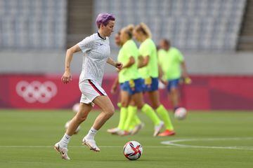CHOFU, JAPAN - JULY 21: Megan Rapinoe #15 of Team United States warms up prior to the Women's First Round Group G match between Sweden and United States during the Tokyo 2020 Olympic Games at Tokyo Stadium on July 21, 2021 in Chofu, Tokyo, Japan. (Photo b