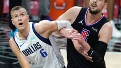 May 25, 2021; Los Angeles, California, USA; Dallas Mavericks center Kristaps Porzingis (6) and LA Clippers center Ivica Zubac (40) jockey for rebounding position during the first quarter of game two in the first round of the 2021 NBA Playoffs. at Staples 