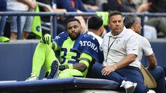 SEATTLE, WASHINGTON - SEPTEMBER 12: Jamal Adams #33 of the Seattle Seahawks is carted off the field during the second quarter against the Denver Broncos at Lumen Field on September 12, 2022 in Seattle, Washington.   Jane Gershovich/Getty Images/AFP