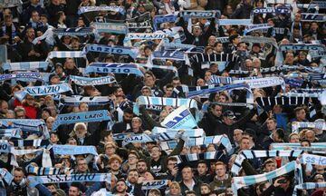 Soccer Football - Serie A - Lazio vs Juventus - Stadio Olimpico, Rome, Italy - March 3, 2018 Lazio fans hold up scarves