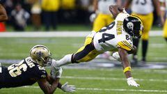 Pittsburgh Steelers wide receiver Antonio Brown (84) is tripped by New Orleans Saints cornerback P.J. Williams (26) on a pass reception in the second half of an NFL football game in New Orleans, Sunday, Dec. 23, 2018. (AP Photo/Butch Dill)