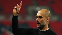 LONDON, ENGLAND - APRIL 14: Josep Guardiola, Manager of Manchester City raises one finger to indicate one more game after the Premier League match between Tottenham Hotspur and Manchester City at Wembley Stadium on April 14, 2018 in London, England.  (Pho