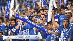 Al-Hilal supporters cheer ahead of the first leg of the AFC Champions League final between Saudi's Al-Hilal and Japan's Urawa Red Diamonds at the King Saud University Stadium in the Saudi capital Riyadh on November 9, 2019.