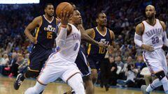 Feb 28, 2017; Oklahoma City, OK, USA; Oklahoma City Thunder guard Russell Westbrook (0) drives to the basket in front of Utah Jazz guard Alec Burks (10) during the second quarter at Chesapeake Energy Arena. Mandatory Credit: Mark D. Smith-USA TODAY Sports
