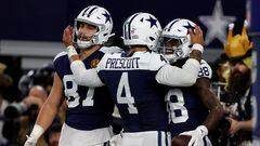 ARLINGTON, TEXAS - NOVEMBER 23: Dak Prescott #4 and CeeDee Lamb #88 of the Dallas Cowboys celebrate after a touchdown with Jake Ferguson #87 in the game against the Washington Commanders during the third quarter at AT&T Stadium on November 23, 2023 in Arlington, Texas.   Richard Rodriguez/Getty Images/AFP (Photo by Richard Rodriguez / GETTY IMAGES NORTH AMERICA / Getty Images via AFP)
