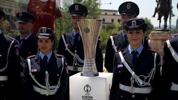 Tirana (Albania), 24/05/2022.- Municipality police pose next to the UEFA Conference League trophy on display in Skanderbeg Square in Tirana, Albania, 24 May 2022. Feyenoord Rotterdam will face AS Roma in their UEFA Europa Conference League final on 25 May 2022. EFE/EPA/MALTON DIBRA
