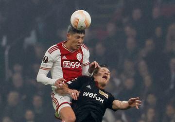 Ajax Amsterdam's Edson Alvarez in action with Union Berlin's Kevin Behrens.