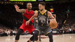 Feb 14, 2018; Portland, OR, USA; Golden State Warriors guard Stephen Curry (30) drives to the basket against Portland Trail Blazers guard Damian Lillard (0) during the first half at the Moda Center. Mandatory Credit: Troy Wayrynen-USA TODAY Sports
