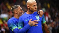 Brazil's forward Richarlison (R) celebrates after scoring his team's second goal during the friendly football match between Brazil and Tunisia at the Parc des Princes in Paris on September 27, 2022.