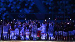 Athletes celebrate during the closing ceremony of the Tokyo 2020 Olympic Games, at the Olympic Stadium, in Tokyo, on August 8, 2021.