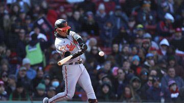 BOSTON, MASSACHUSETTS - MARCH 30: Ramon Urias #29 of the Baltimore Orioles hits a home run during the fourth inning against the Boston Red Sox on Opening Day at Fenway Park on March 30, 2023 in Boston, Massachusetts.   Paul Rutherford/Getty Images/AFP (Photo by Paul Rutherford / GETTY IMAGES NORTH AMERICA / Getty Images via AFP)