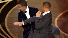 Will Smith hits at Chris Rock as Rock spoke on stage during the 94th Academy Awards in Hollywood, Los Angeles, California, U.S., March 27, 2022. REUTERS/Brian Snyder     TPX IMAGES OF THE DAY