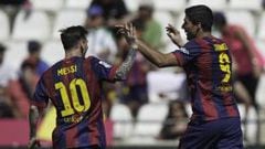 CORDOBA, SPAIN - MAY 02:  Luis Suarez (R) of FC Barcelona celebrates scoring their second goal with team-mate Lionel Messi (L) during the La Liga match between Cordoba CF and Barcelona FC at El Arcangel stadium on May 2, 2015 in Cordoba, Spain.  (Photo by Gonzalo Arroyo Moreno/Getty Images)