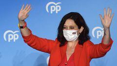 Madrid regional president and People&#039;s Party (PP) candidate Isabel Diaz Ayuso waves to supporters at the People&#039;s Party (PP) headquarters in Madrid after the Madrid regional elections on May 4, 2021. - Spain&#039;s right-wing People&#039;s Party